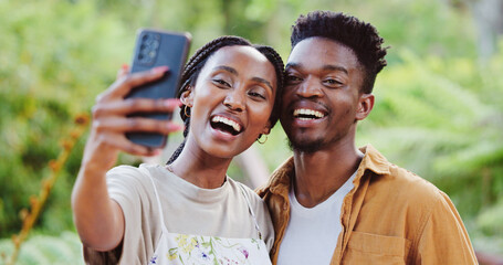 Black couple, outdoor and selfie in park with holiday, love and care together with social media and smile. Happy, people and bonding on summer vacation with profile picture in garden on website