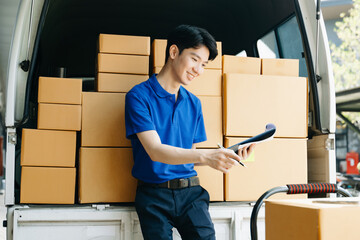 Asian courier delivery man searching the address on digital tablet.  near van outside the warehouse. This is a freight transportation