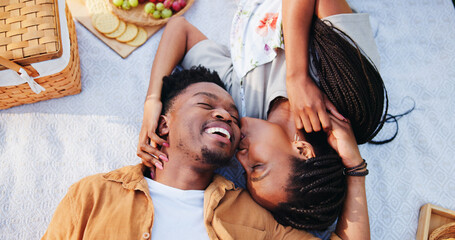 Above, kiss and smile with black couple and picnic for bonding, happiness and romantic date. Love,...