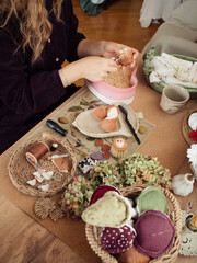 Woman Stuffing Teddy Fox with Sawdust at Her Cozy Desk