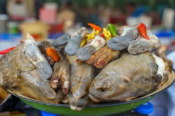 A plate of food with a variety of meats and vegetables