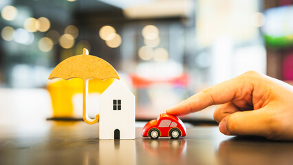 House and car model, Security protection and health insurance. The concept of family home,...