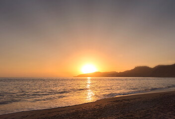 Souvenir from Almuñecar, sunset from San Cristobal beach, tourist destination on the coast of Granada, Andalusia, Spain,