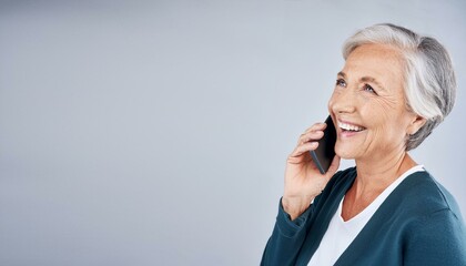Studio, senior woman and smile with phone call for communication, chat and funny joke with contact. Mockup space, female person and thinking with mobile for conversation, listening or gray background