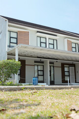 Modern Facade Of A New House With Two Floors From Extreme Angle
