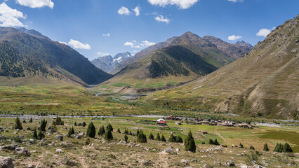 Scenic rural mountain landscape with village in Deosai National Park, Astore, Gilgit Baltistan, Pakistan