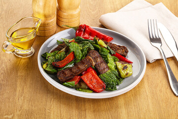 Salad with grilled beef steak