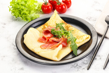 Russian pancake with salmon fish