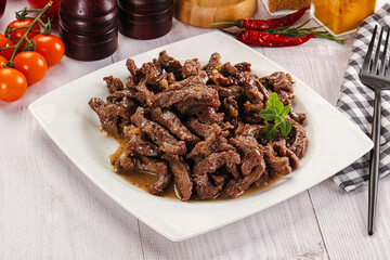 Stew beef slices with gravy