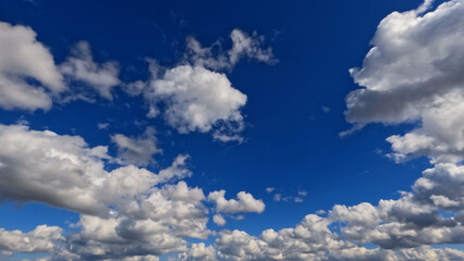 pretty big white clouds in the blue sky bg - photo of nature