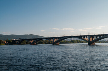 Fototapeta premium communal bridge over the Yenisei River in Krasnoyarsk at dawn