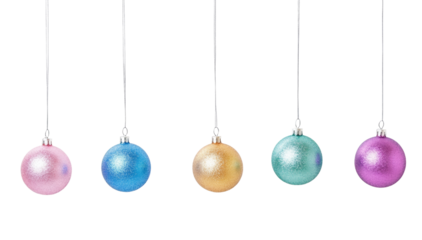 Five shiny Christmas ornaments in pastel colors hang elegantly from strings, adding a cheerful vibe to the celebration on white transparent background or PNG