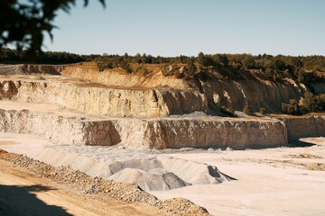 Midday sunlight over sandy quarry
