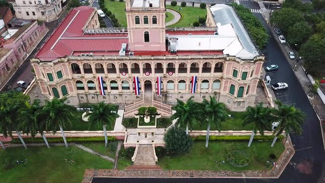 Paraguay Government palace stands prominently in the city center, showcasing flags and architectural beauty amidst urban scenery