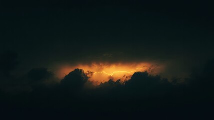 Obraz premium Lightning flashing behind a dark stormy cloud at sunset, casting an eerie glow