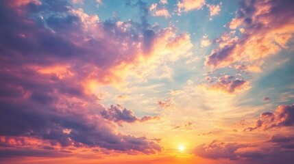 Fototapeta premium Text: Tranquil sunset skies adorned with delicate pastel clouds. Textured wallpaper showcasing the beauty of the sky. Captivating photomural featuring a fiery orange sunset