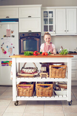 Vegetables, cooking and portrait of child in kitchen for healthy eating, wellness and vegetarian diet. Happy, vitamins and young girl in home with organic ingredients for lunch, dinner and meal prep