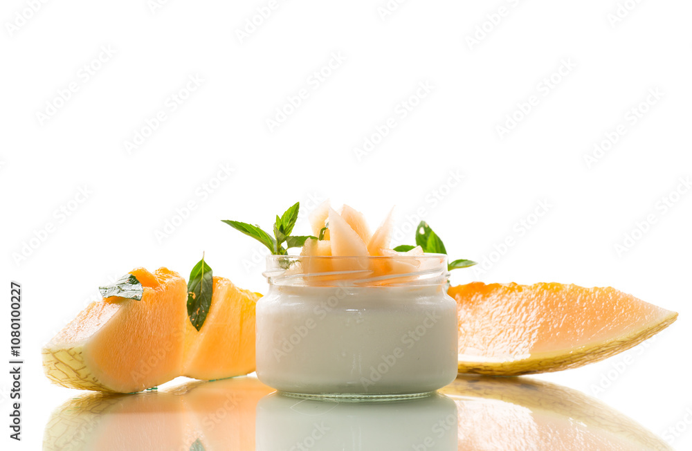 Wall mural sweet homemade yogurt in a jar with pieces of ripe melon