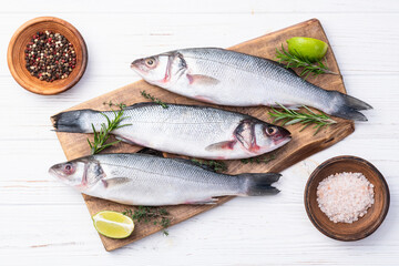 Raw sea bass fish photography . Top view