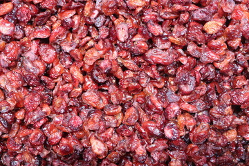 Dried Cranberries Displayed In Bulk For Sale, Perfect As A Snack Or Ingredient In Recipes