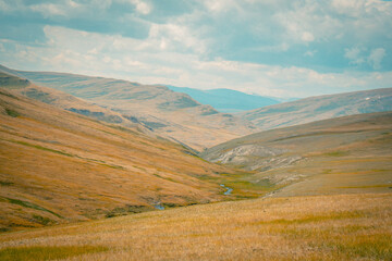 Mountain panorama of beautiful valley in Altai mountains. Altai Mountain range, North Altai, Gorny...