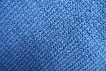 Top view of simple plain blue knitted fabric