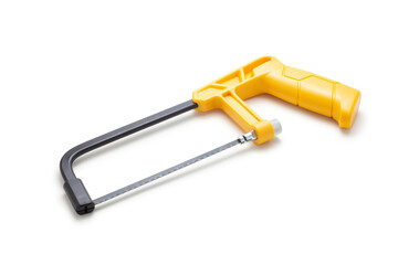 Yellow hand hack saw blade isolated on white background