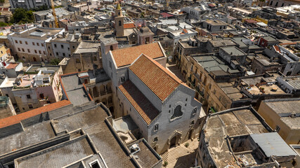 Fototapeta premium Aerial view of the Cathedral of Bisceglie, in Puglia, Italy. The Romanesque church of Saint Peter Apostle is located in the historic center of the town.