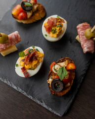 Holiday Appetizer Set with Deviled Eggs, Bruschettas, and Spirals