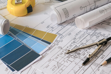 architect design working drawing sketch plans blueprints and making architectural construction...