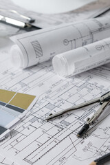 Architects concept,eco project house,Retrofit movement,engineer architect designer working drawing sketch plans blueprints and making construction eco model