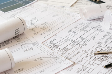 architect design working drawing sketch plans blueprints and making architectural construction...