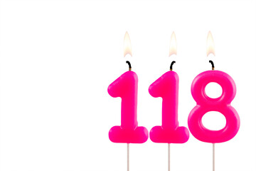 Pink number 118 birthday candle on white background