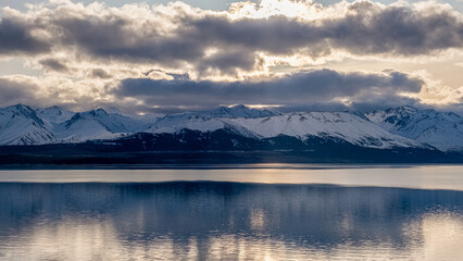 Snowy mountains and lake Tekapo, winter in New Zealand