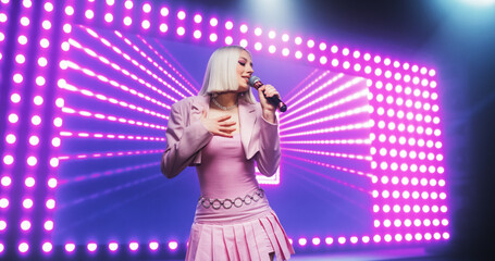 Fans Experiencing a Powerful Musical Performance by a Talented Young Singer. Beautiful Pop Band...