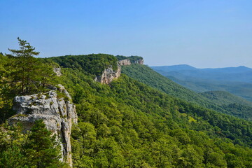 Green valley with a mountain range in Dakhovskaya village