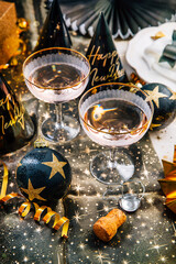 Elegant place setting for Christmas, New Years Eve, glasses of sparkling wine
