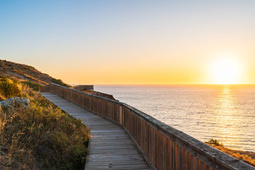 Fototapeta premium Iconic Hallett Cove boardwalk along the coast during sunset, South Australia