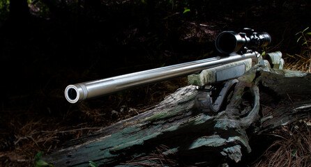 Rifle that is of an inline muzzleloader design and 50 caliber that uses blackpowder substitute on a...