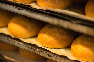 Close up image of bread rolls in a bakery