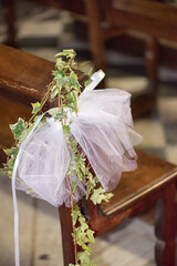 A simple wedding floral decoration in a church in Genova, Italy