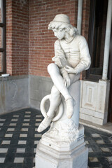 Sculpture of Christopher Columbus as a boy by Giulio Monteverde inside the D Albertis Castle,...