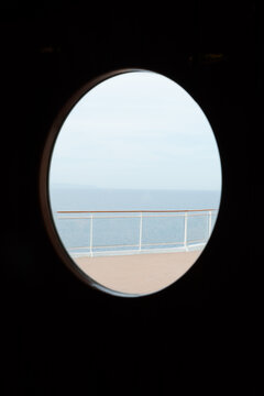 Fototapeta The open sea seen from a cruise ship porthole from one of the exit doors.