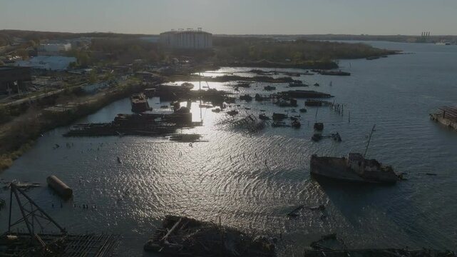 flying backwards over Staten Island Boat Graveyard