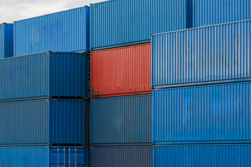 Fototapeta premium Stacked intermodal containers at the seaport.