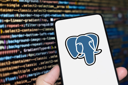 PostgreSQL logo sign on the smartphone screen with code background. London, UK, 11.14.2024