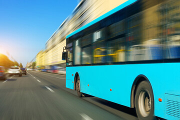Blue bus view on the road in city rushes motion blur speed effect along the city street on the route