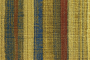 Obraz premium Colorful striped fabric showcasing intricate weave patterns in textile