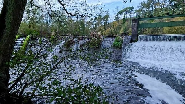Waterfall weir barrier on river wye fish pass 