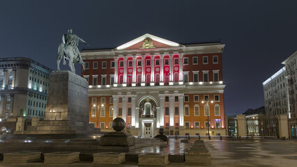 Historical building of Moscow City Hall at Tverskay street at evening lightning timelapse...